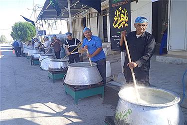 تصویر پخت یک تن و دویست کیلو حلیم نذری در شهر فال