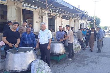 تصویر پخت یک تن و دویست کیلو حلیم نذری در شهر فال